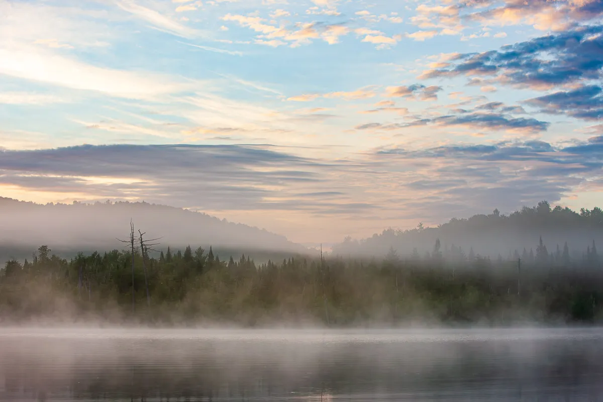 Misty morning over a river valley
