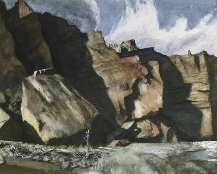 Edward Hopper painting of a stone cliff face with a single bare tree catching light against shadowed rock.